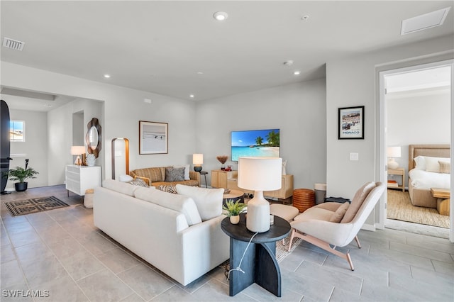 living room with light hardwood / wood-style flooring