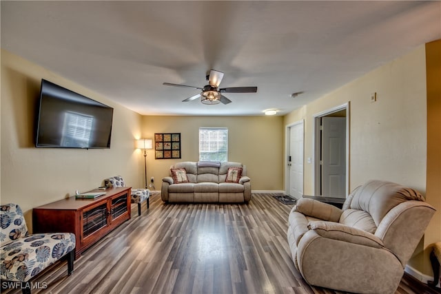 living room with hardwood / wood-style floors and ceiling fan