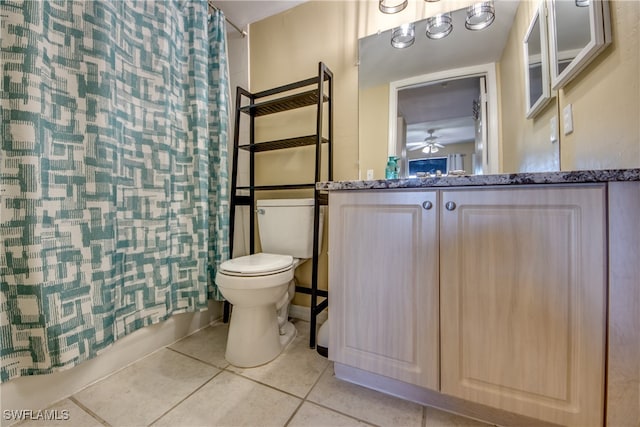 full bathroom featuring shower / bath combination with curtain, vanity, ceiling fan, tile patterned flooring, and toilet