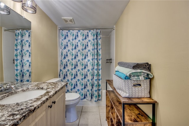 full bathroom with tile patterned flooring, shower / bath combo, vanity, and toilet