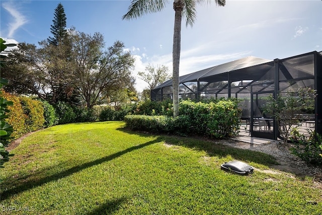 view of yard featuring a lanai