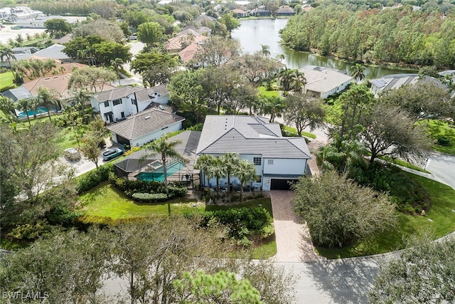 bird's eye view with a water view