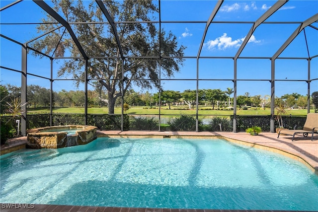 view of pool with an in ground hot tub and a lanai