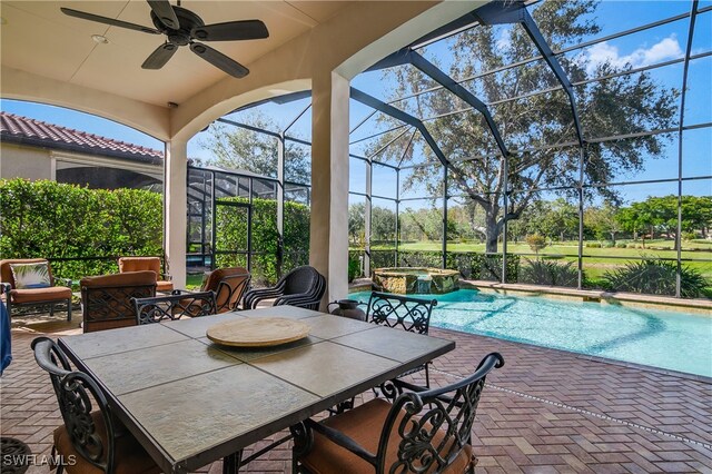 view of patio with a pool with hot tub, a lanai, an outdoor hangout area, and ceiling fan