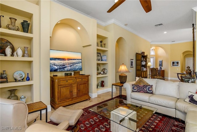 living room featuring light tile patterned floors, ornamental molding, built in features, and ceiling fan