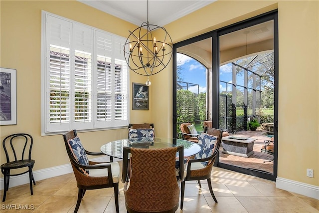 dining space featuring light tile patterned flooring, a wealth of natural light, and a chandelier