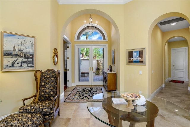 foyer with an inviting chandelier