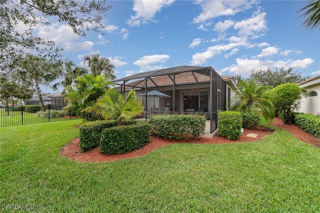 view of yard featuring a lanai