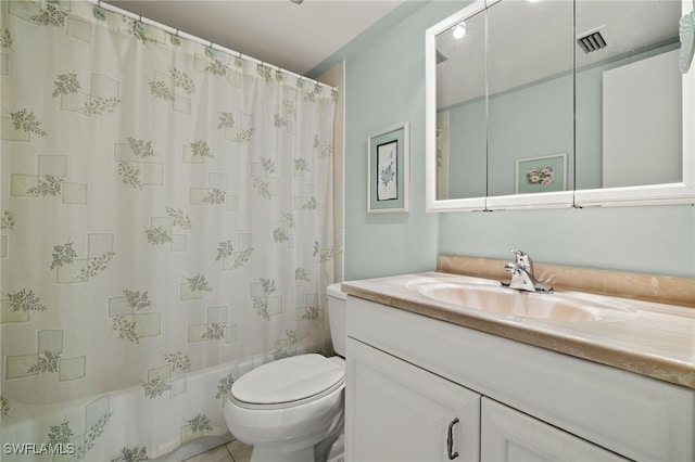 full bathroom featuring tile patterned floors, shower / bath combination with curtain, toilet, and vanity