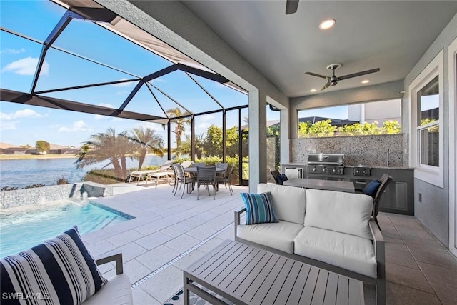 view of patio with glass enclosure, grilling area, a water view, pool water feature, and area for grilling