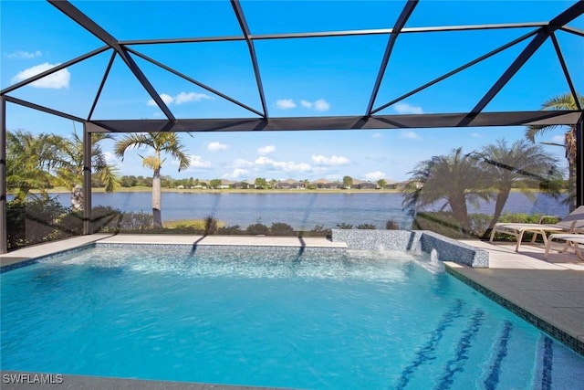 view of pool featuring glass enclosure, pool water feature, a patio area, and a water view