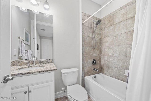 full bathroom with vanity, shower / bath combo, and toilet