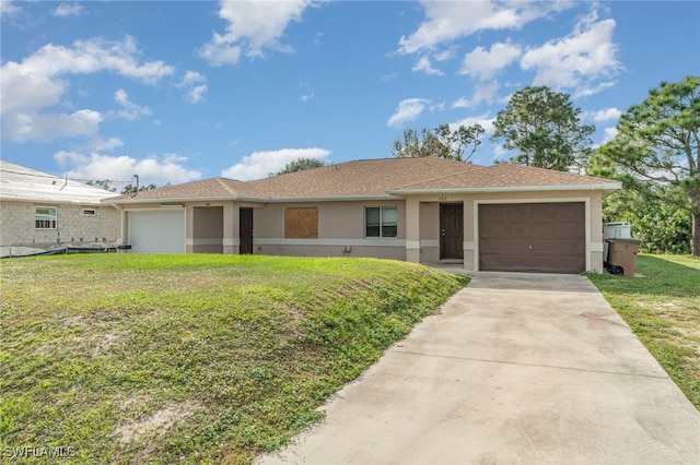 ranch-style home with a front yard and a garage