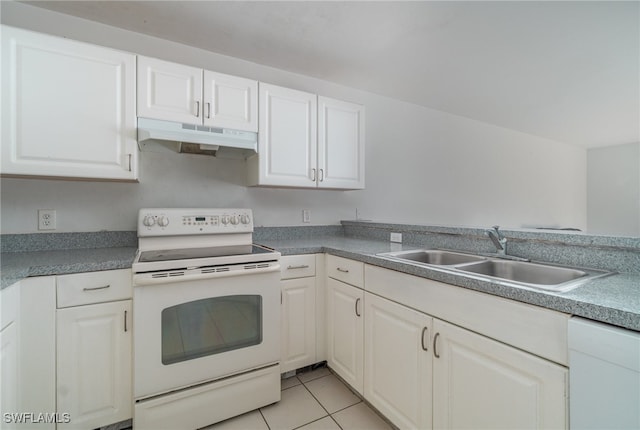 kitchen with white cabinetry, white appliances, sink, and light tile patterned floors