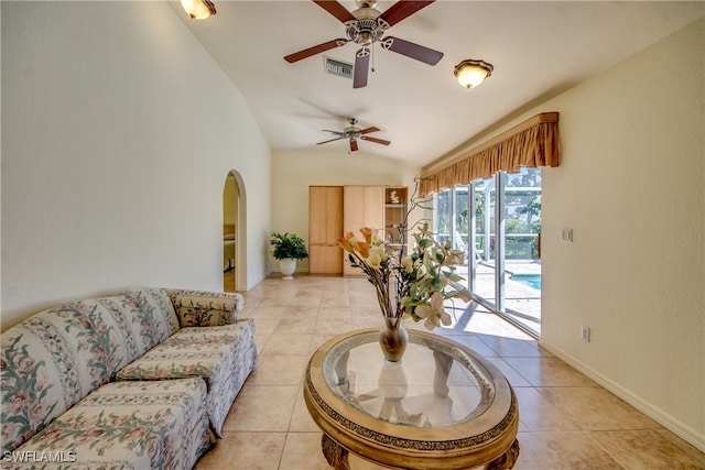 tiled living room with vaulted ceiling and ceiling fan