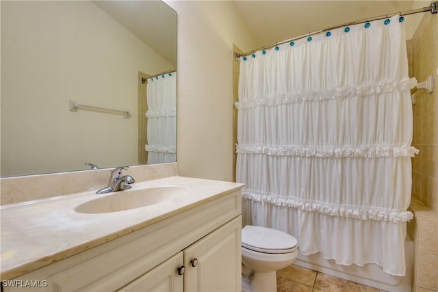 full bathroom featuring tile patterned flooring, vanity, toilet, and shower / bathtub combination with curtain