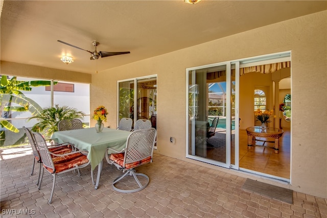 view of patio / terrace featuring ceiling fan