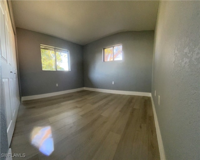 spare room featuring light hardwood / wood-style floors