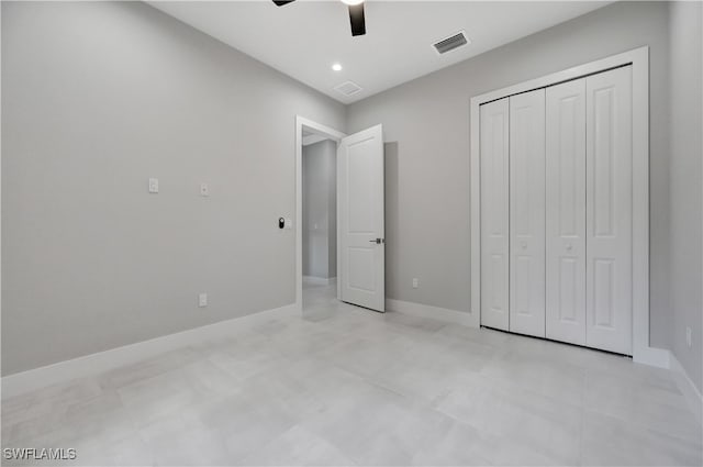 unfurnished bedroom with a closet and ceiling fan