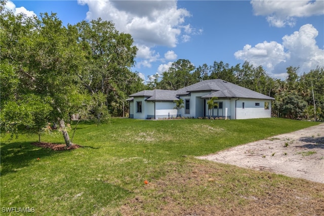 exterior space featuring a front lawn