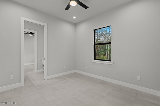 empty room featuring ceiling fan