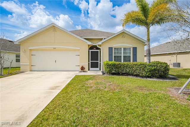 ranch-style home with cooling unit, a garage, and a front lawn