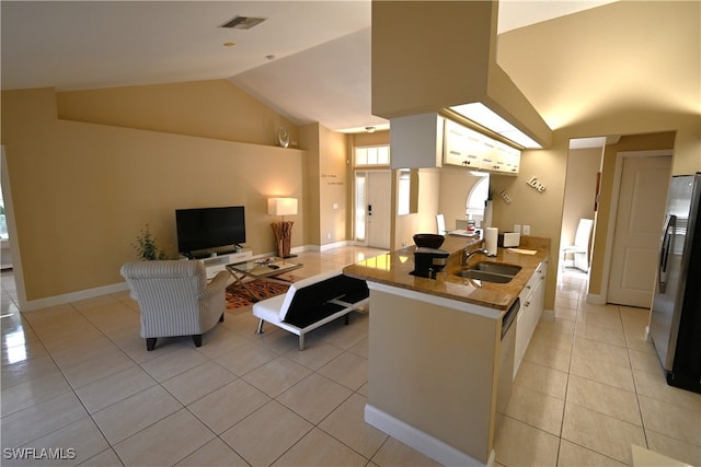 kitchen with sink, white cabinetry, stainless steel appliances, and light tile patterned floors