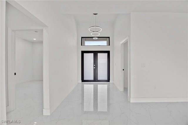 foyer featuring french doors