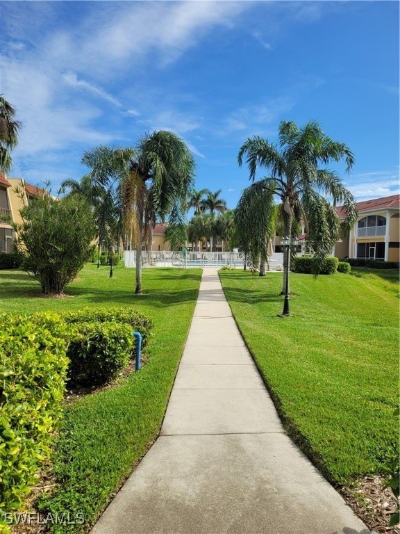 view of community featuring a lawn