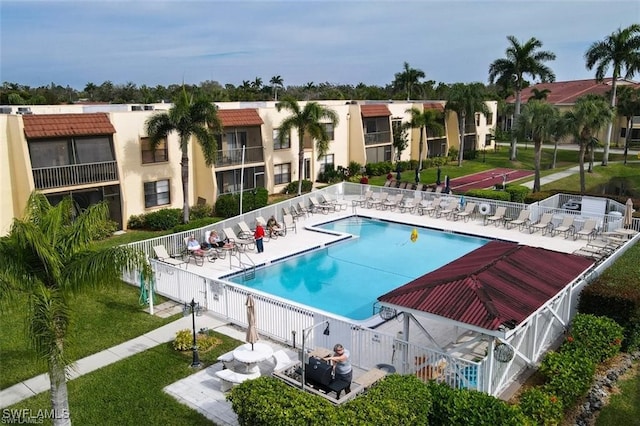 view of swimming pool with a patio