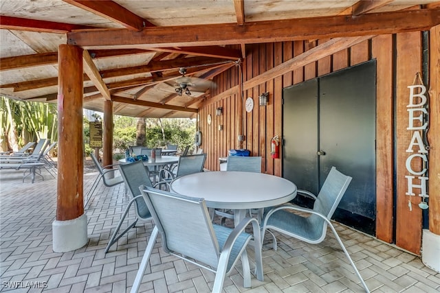 view of patio featuring ceiling fan