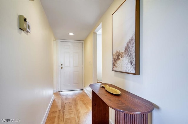 entryway with light hardwood / wood-style flooring