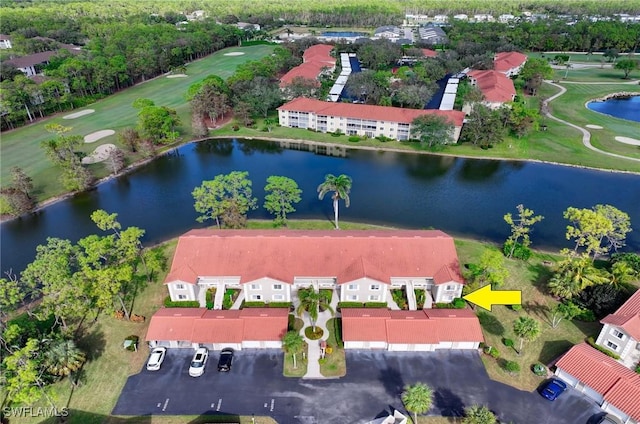 bird's eye view with a water view