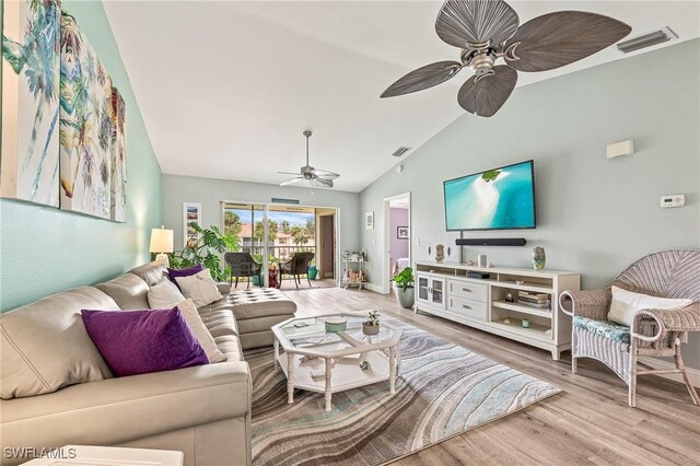 648 Mardel Ct Unit 708, Naples, FL 34104 - living room with lofted ceiling, a ceiling fan, and light wood-style floors