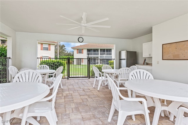 view of patio featuring ceiling fan