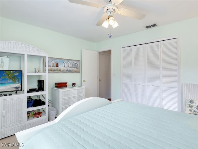 bedroom with a closet and ceiling fan