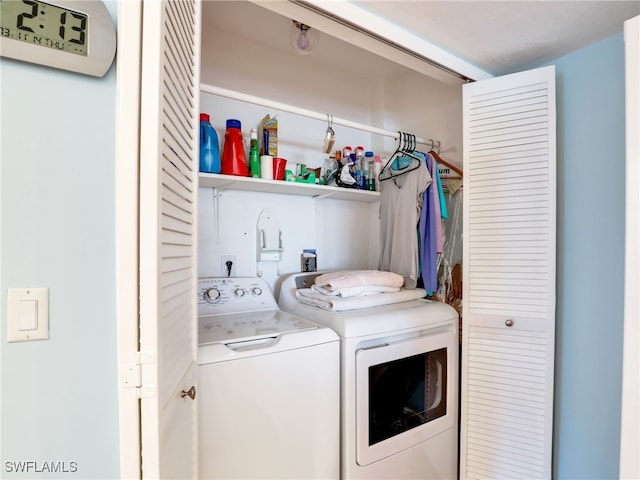 clothes washing area with independent washer and dryer