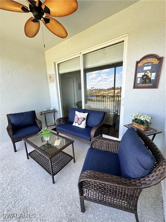 view of patio / terrace featuring ceiling fan and an outdoor hangout area