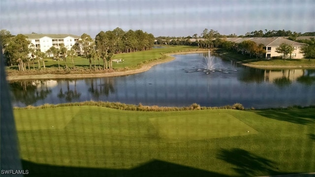 view of property's community with a water view