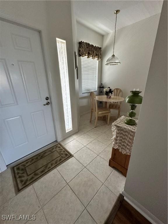 entrance foyer featuring light tile patterned flooring