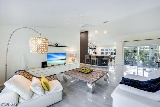 living room with ceiling fan