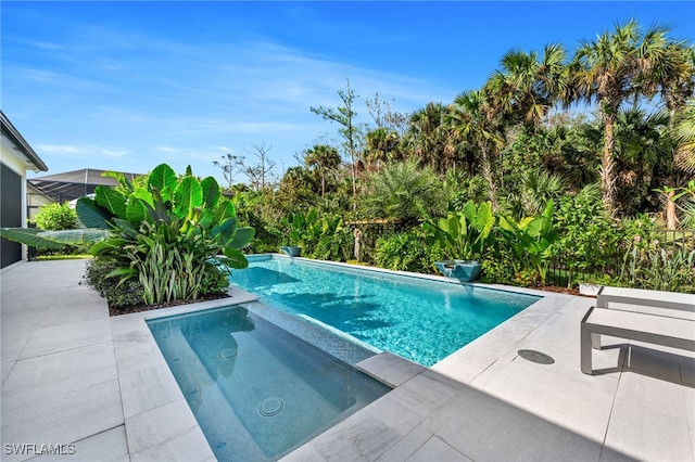 outdoor pool with a patio