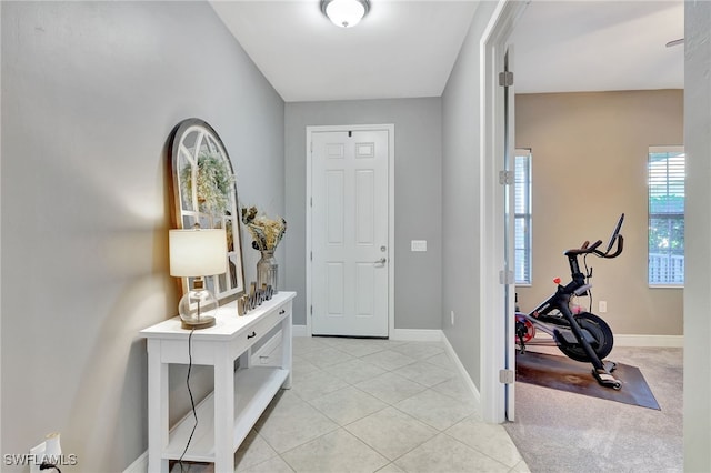 foyer with light tile patterned floors