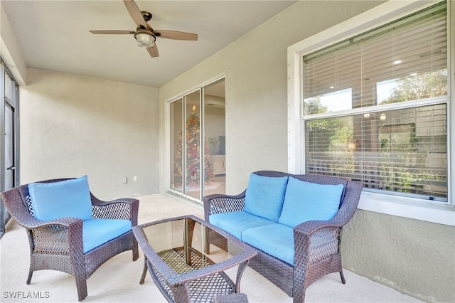 view of patio / terrace featuring ceiling fan