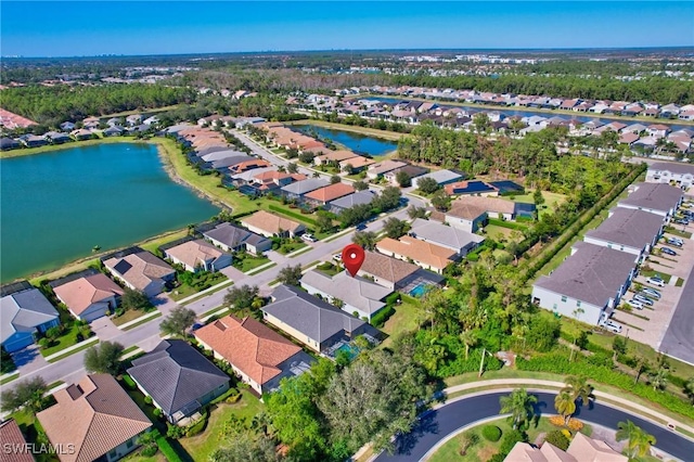 drone / aerial view with a water view