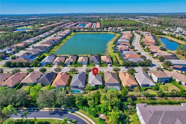 drone / aerial view with a water view