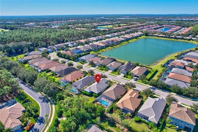 drone / aerial view with a water view