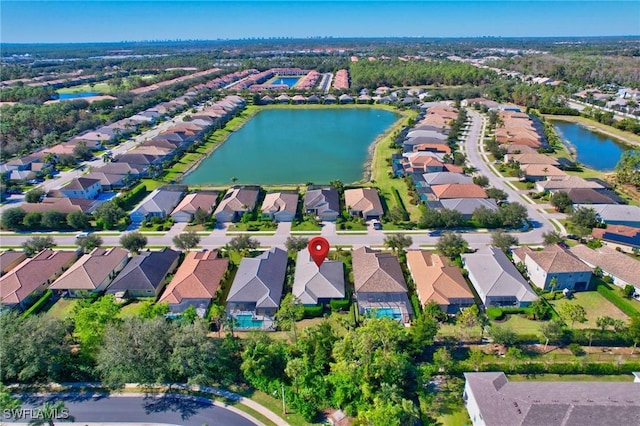 drone / aerial view featuring a water view