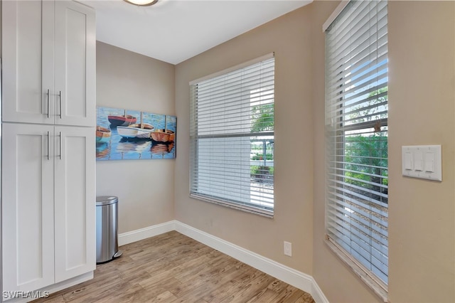 dining space with light wood-type flooring