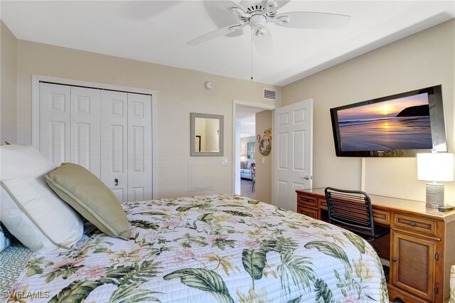 bedroom featuring ceiling fan and a closet